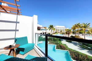 Poolside Junior Suite Ocean View at TRS Cap Cana Hotel